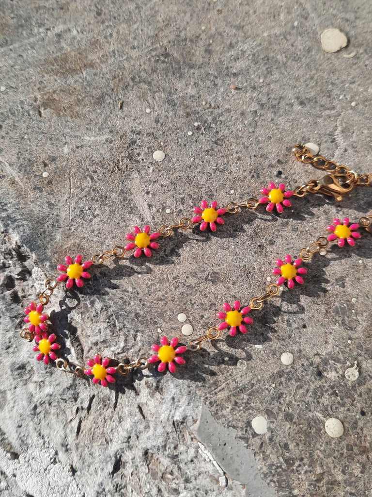 roestvrij staal armbandje met roze/geel bloemetjes